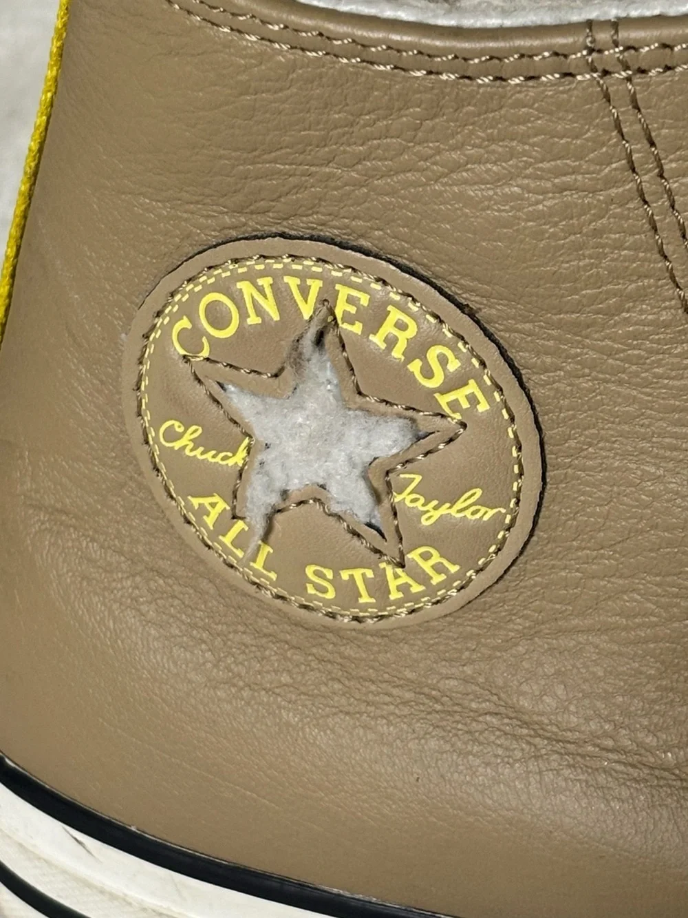 Converse Kids Tan High-Top Sneakers with White Sherpa Lining and Yellow Pull Tab